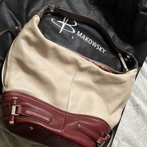 Women’s Leather B Makowsky Bucket Bag, can be a conceal carry bag for small gun.